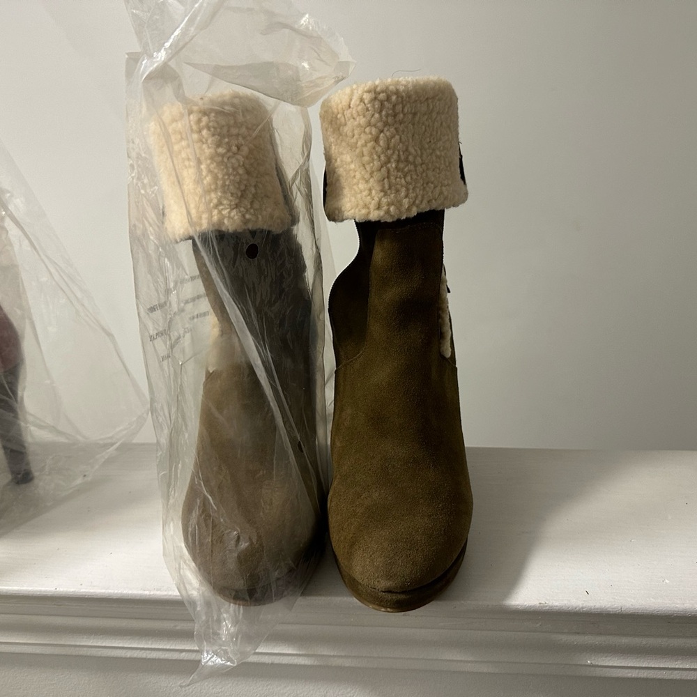 Nine West mid calf wedge boots with Shepa lining.